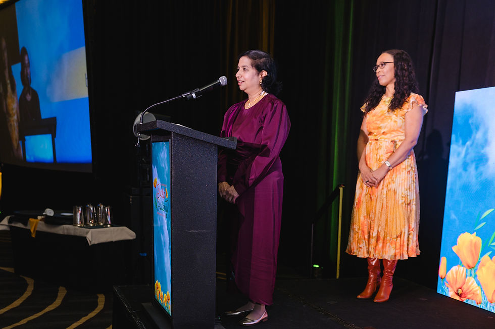 Srivaths, Dr. Lakshmi receiving John P McGovern Award