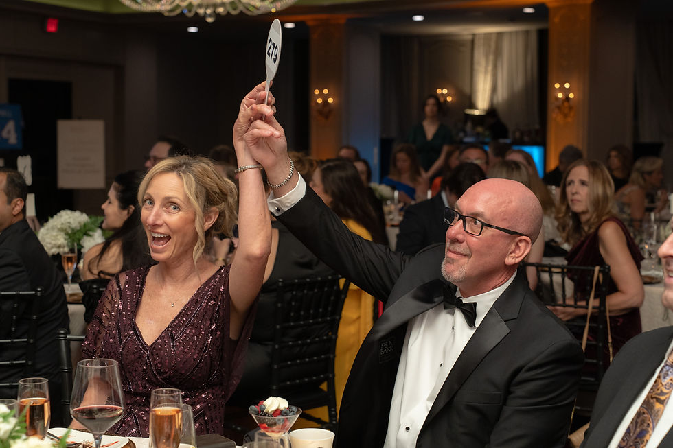 Lynn and Ed Jones during gala auction by JH Photography