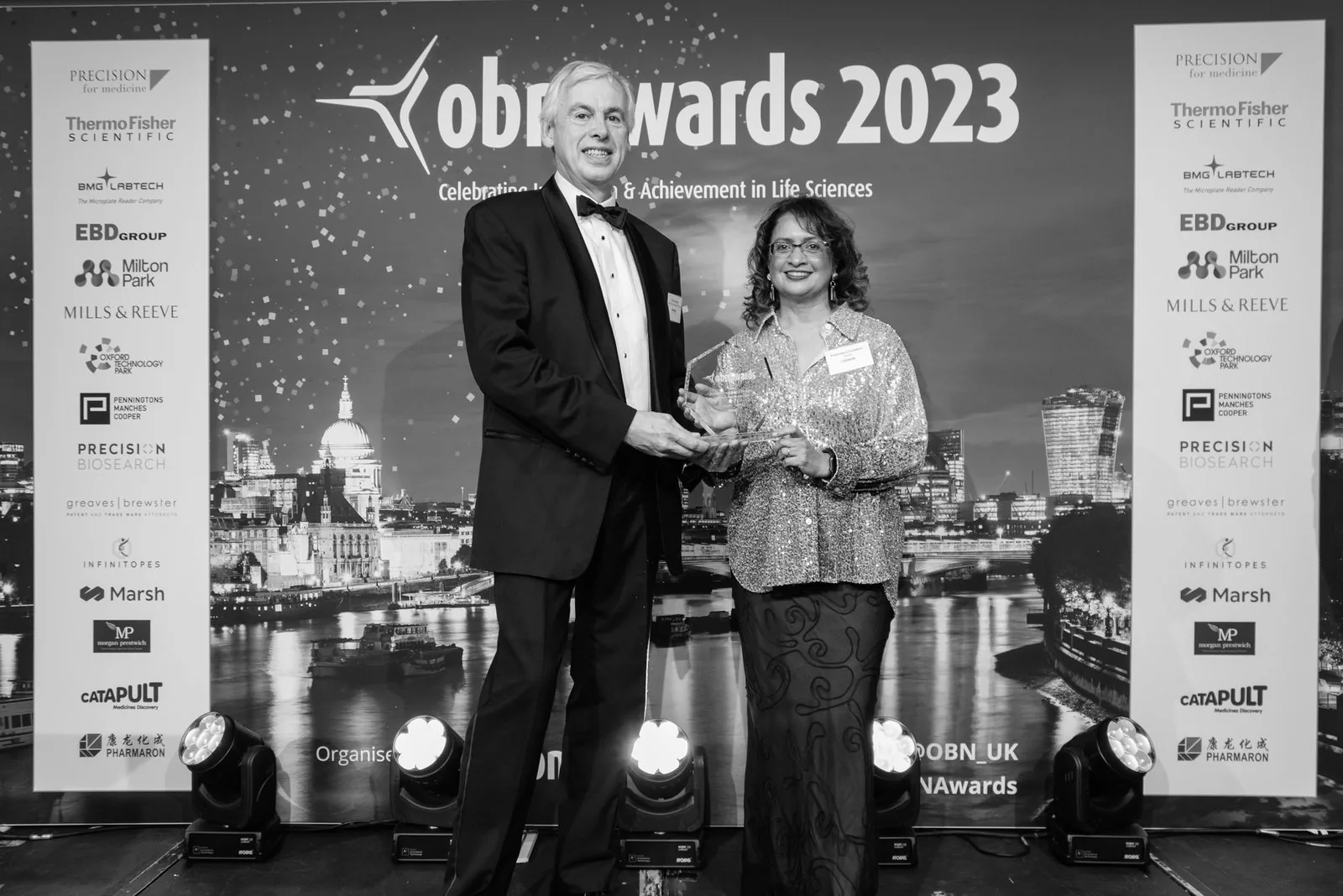 Novai receiving an award on stage at the OBN Awards 2023.