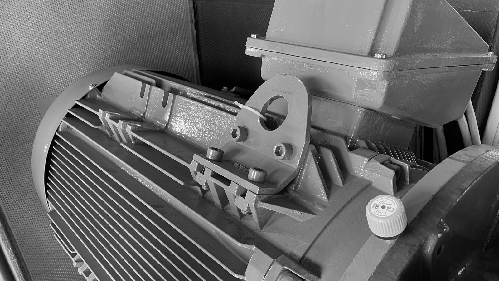 An 8power wireless sensor fitted to an industrial electric motor.