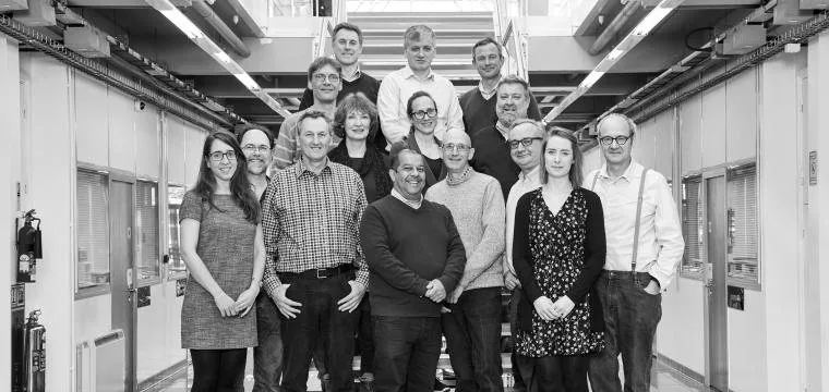 The Cellesce team on a staircase in a laboratory building.