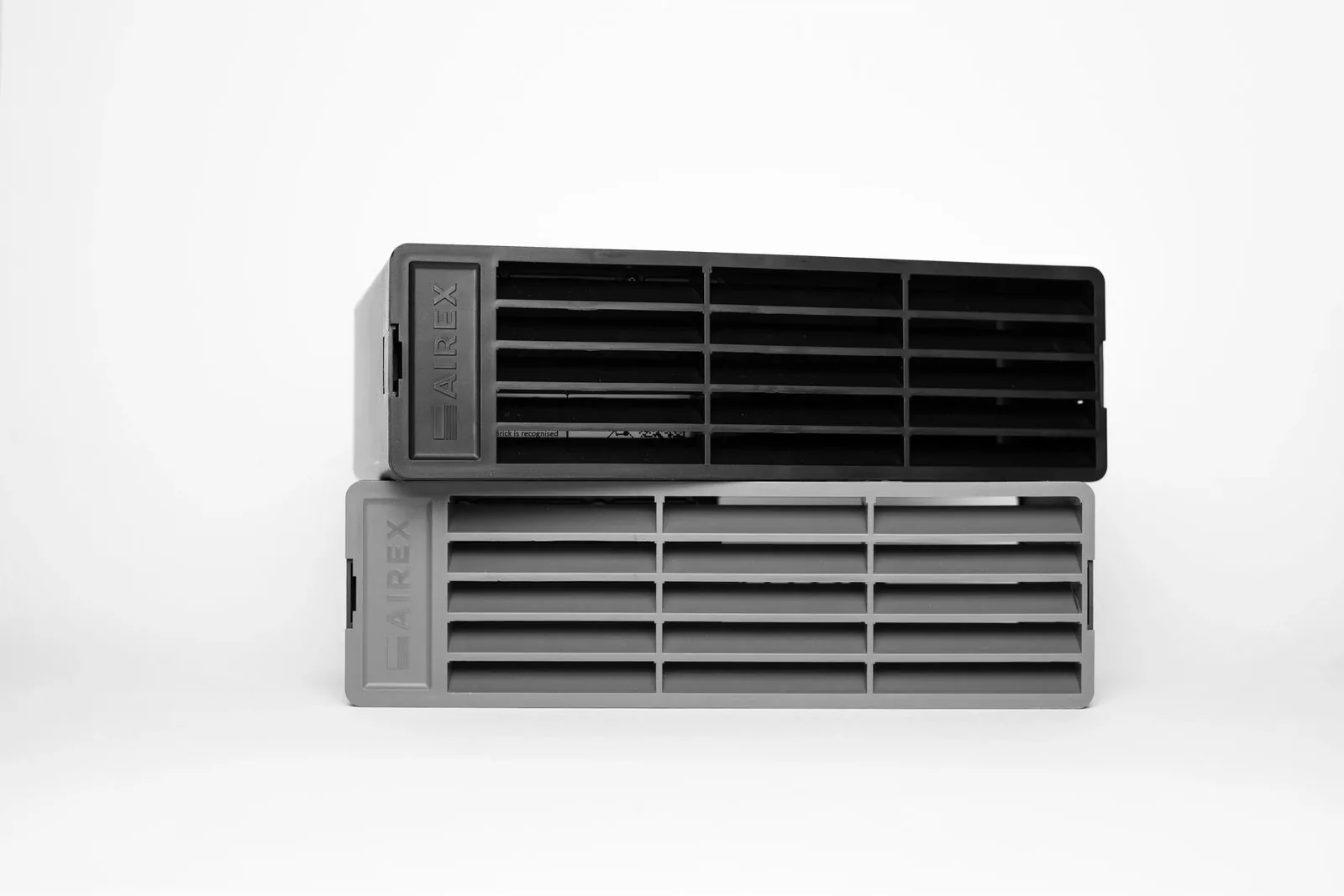 Two AirEx smart air bricks stacked on top of each other.