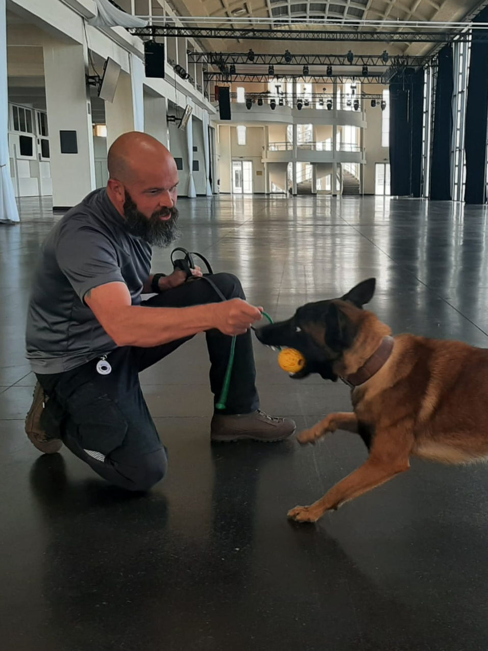 Tom Moir Dog handler with a German Shepard Dog