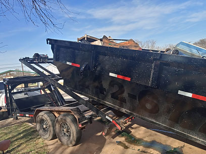 RD Truck loading trash trailer.jpg