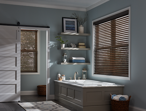 brown toned wood blinds covering the windows in a bathroom.
