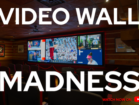 Video wall showing march madness content