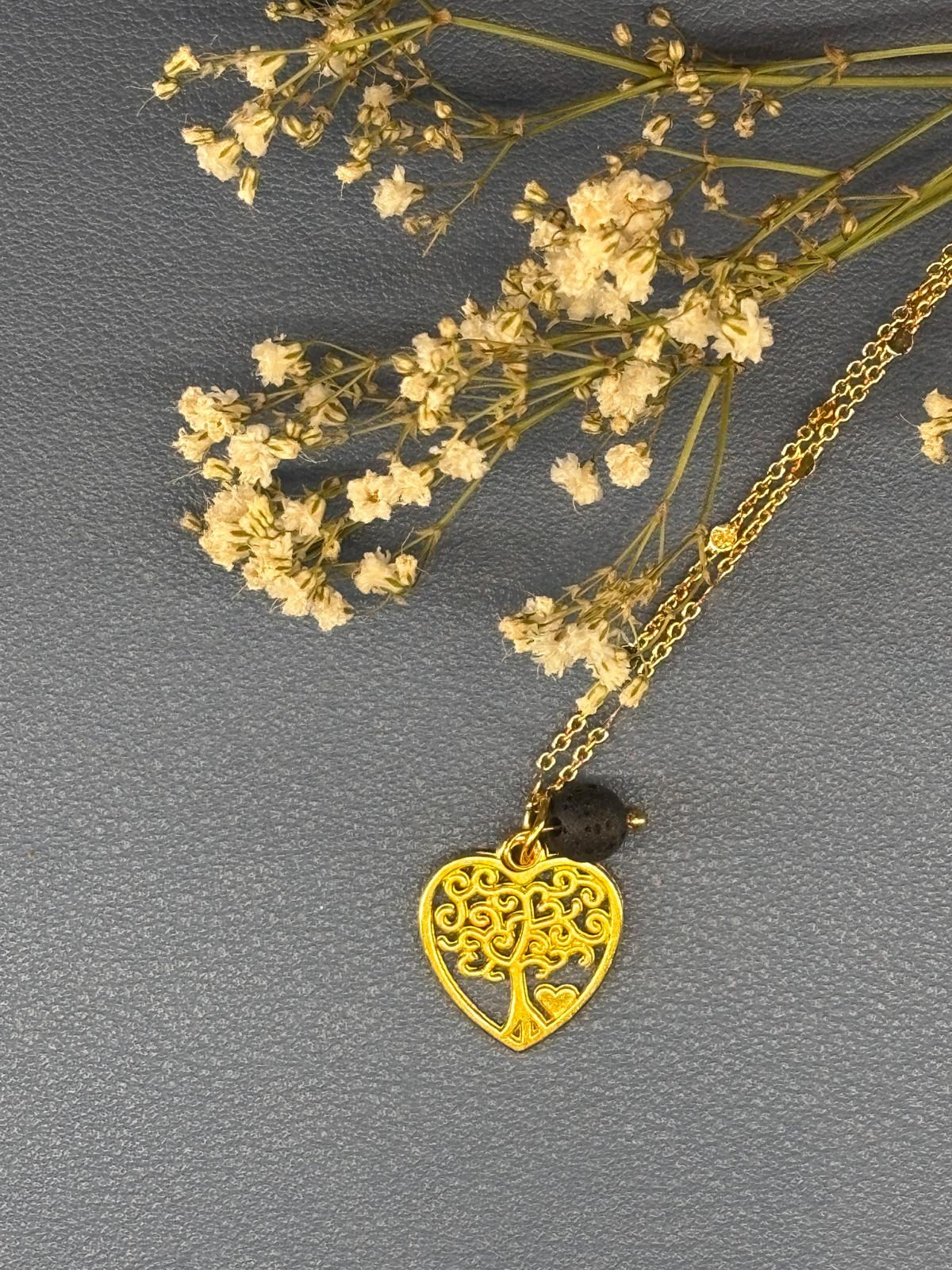 Pendentif doré cœur arbre de vie avec perle noire