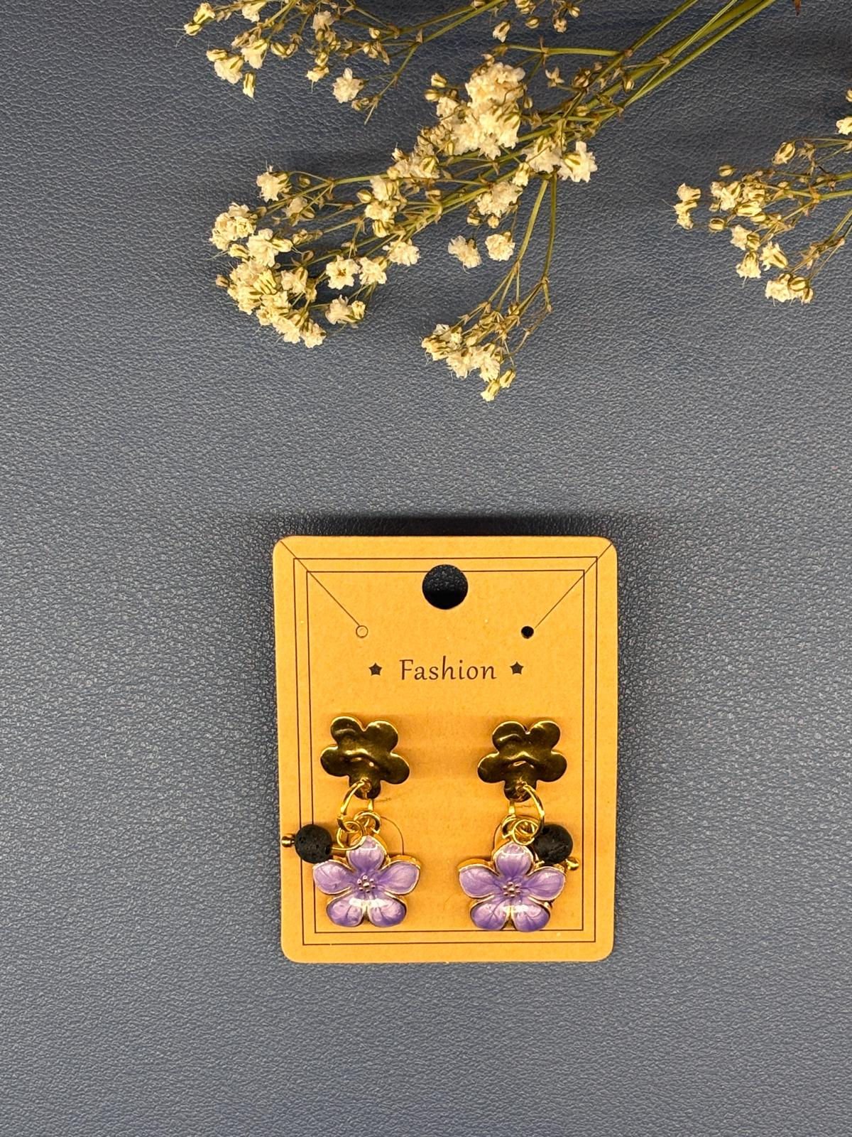 Paire de boucles d'oreilles fleurs violettes