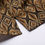 Thumbnail: Straight-cut hem and offset top button, showcasing interlocking block printing and coconut buttons.