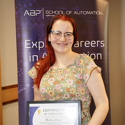 Success Stories Marlena with her certificate