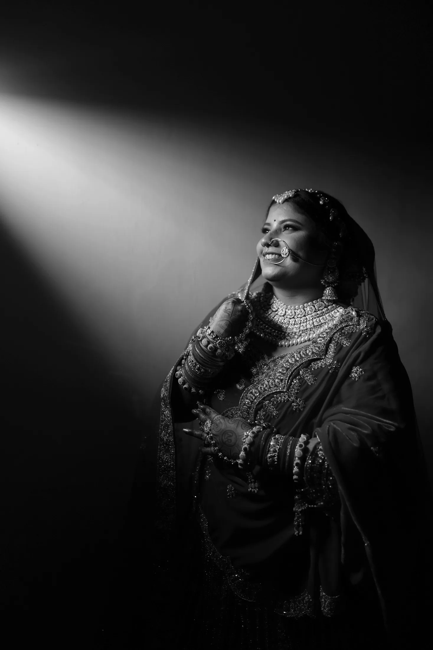 Bride laughing during a black and white portrait