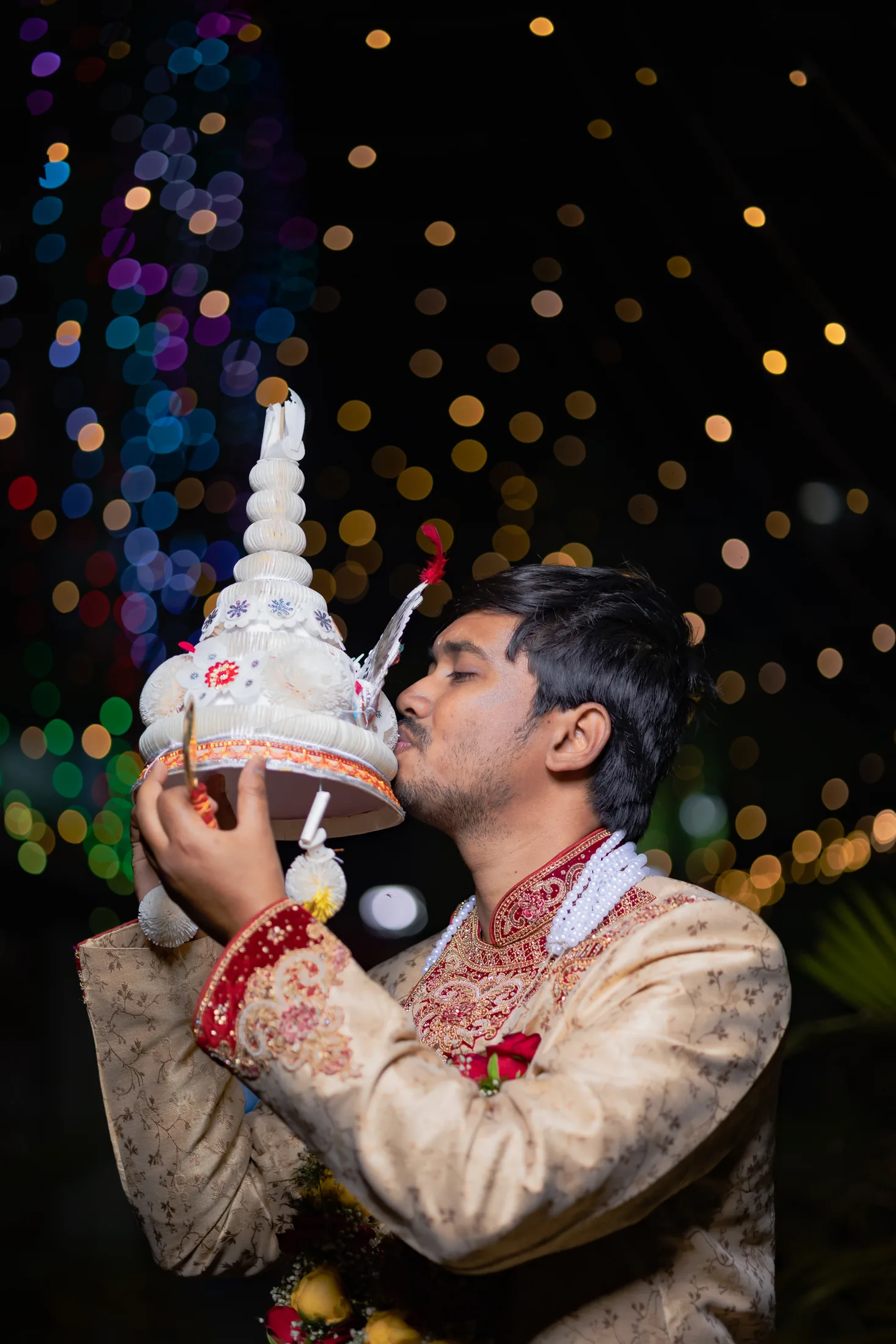 A wedding ritual illuminated by festive lights
