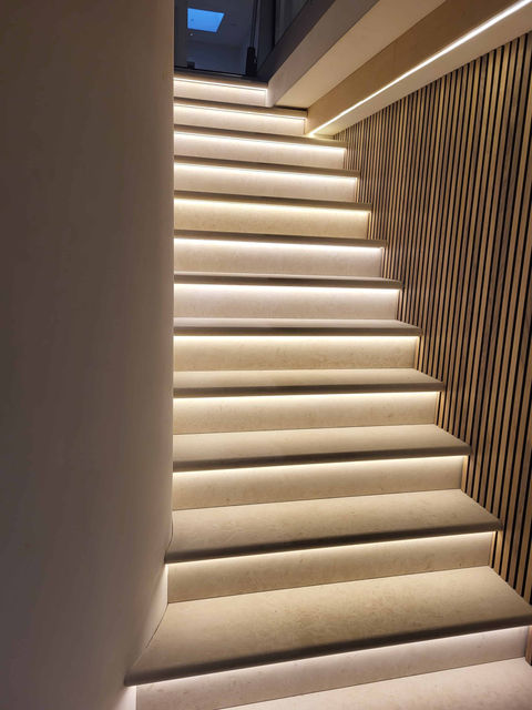 Modern staircase with lighting on each stair.