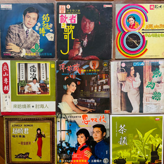 9 vinyl covers on a wood background