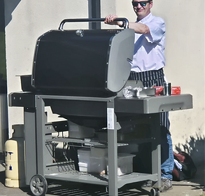 Rebel Paul cooking a delicious bbq for a private gathering