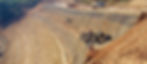 Coir geotextiles being installed on a steep slope for erosion control and slope stabilization.