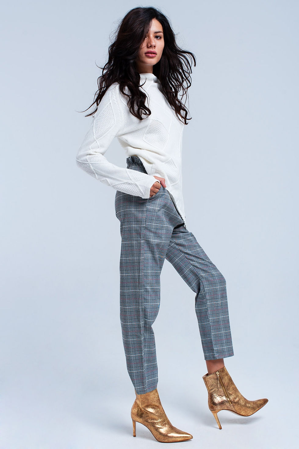 Thumbnail: Red tartan pattern pants on female model side view styling