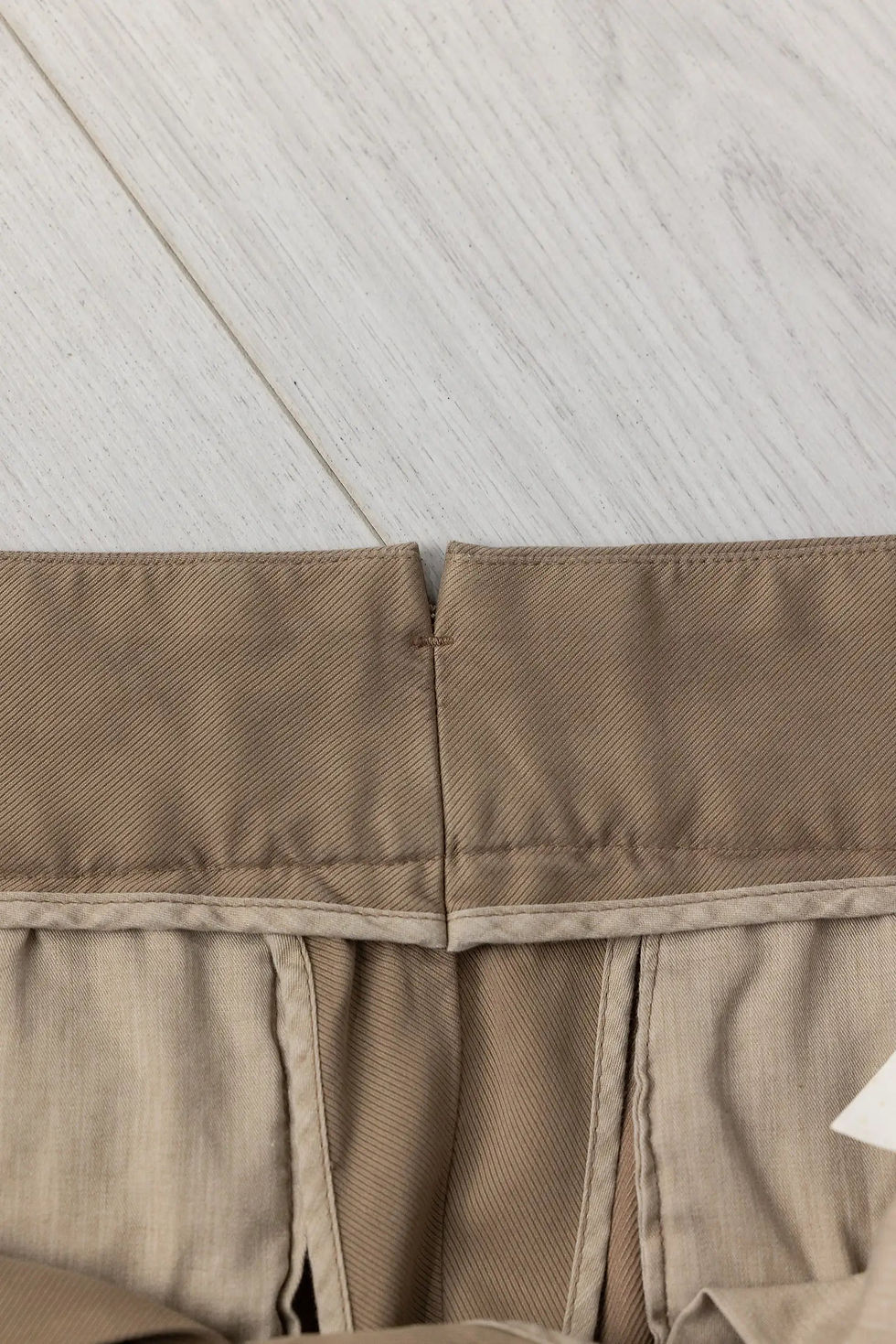 Thumbnail: beige trousers inside view close up