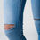 Thumbnail: Torn Knee Jeans knee view on model