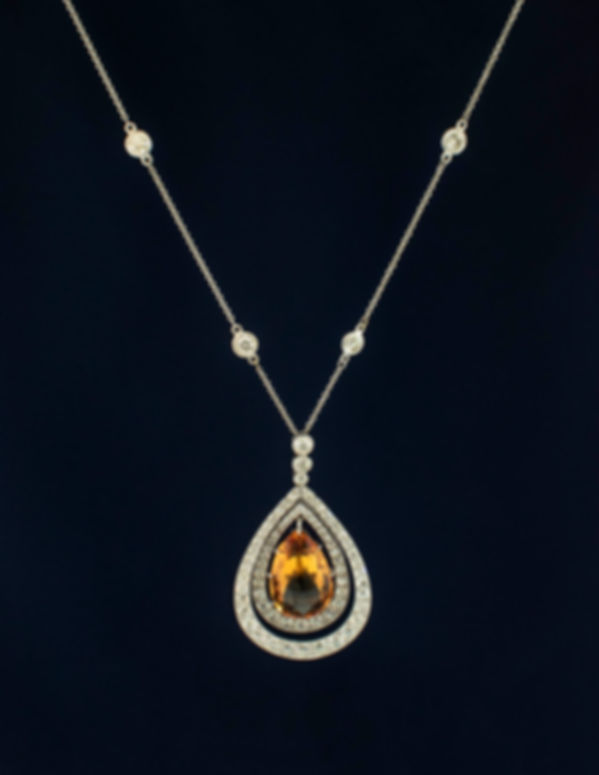 Platinum and White Gold Topaz and Diamond Halo Necklace