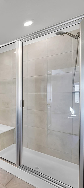 Modern bathroom with a completed tub to shower remodel.