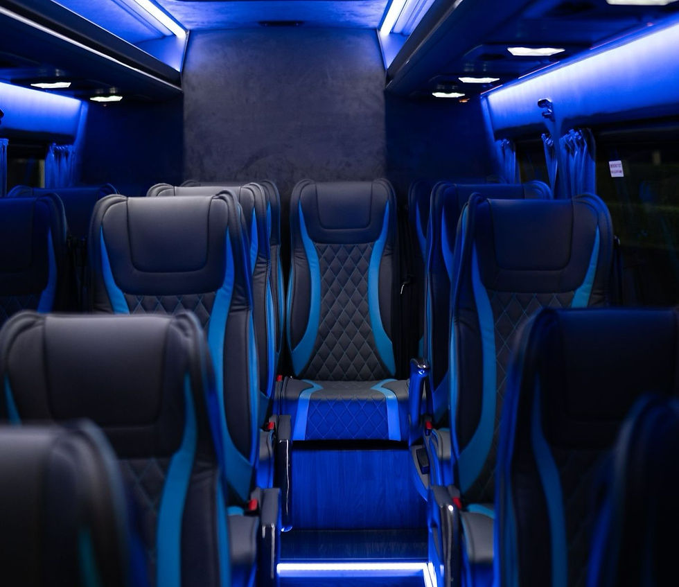 party bus interior, serval black and blue leather seats with blue lighting