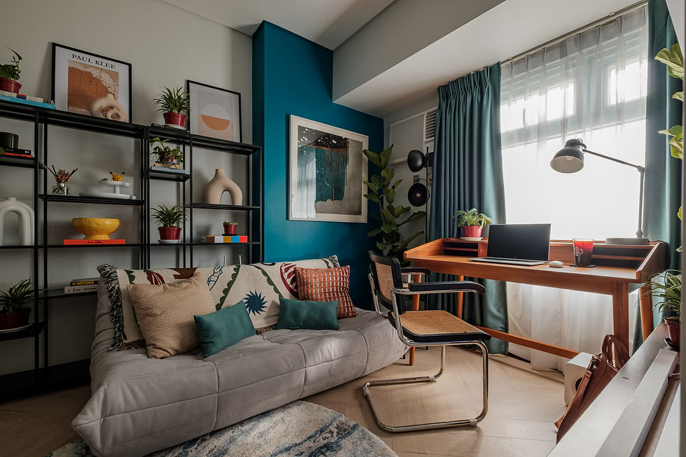 A sophisticated BGC living room featuring Mindful Maximalism with a mix of modern metal furniture and traditional Filipino wood works.