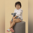 Her left leg is much bigger than her right due to a gene mutation