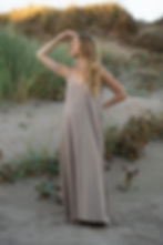 Model wearing Ashvatha Ecowear Dusty Rose slip dress in Ahimsa Raw Khadi silk.