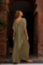 Back view of Ashvatha Ecowear green ceremonial goddess gown in Ahimsa silk with open back and flowing skirt