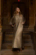 Model wearing Ashvatha Ecowear olive green tunic in Ahimsa silk.