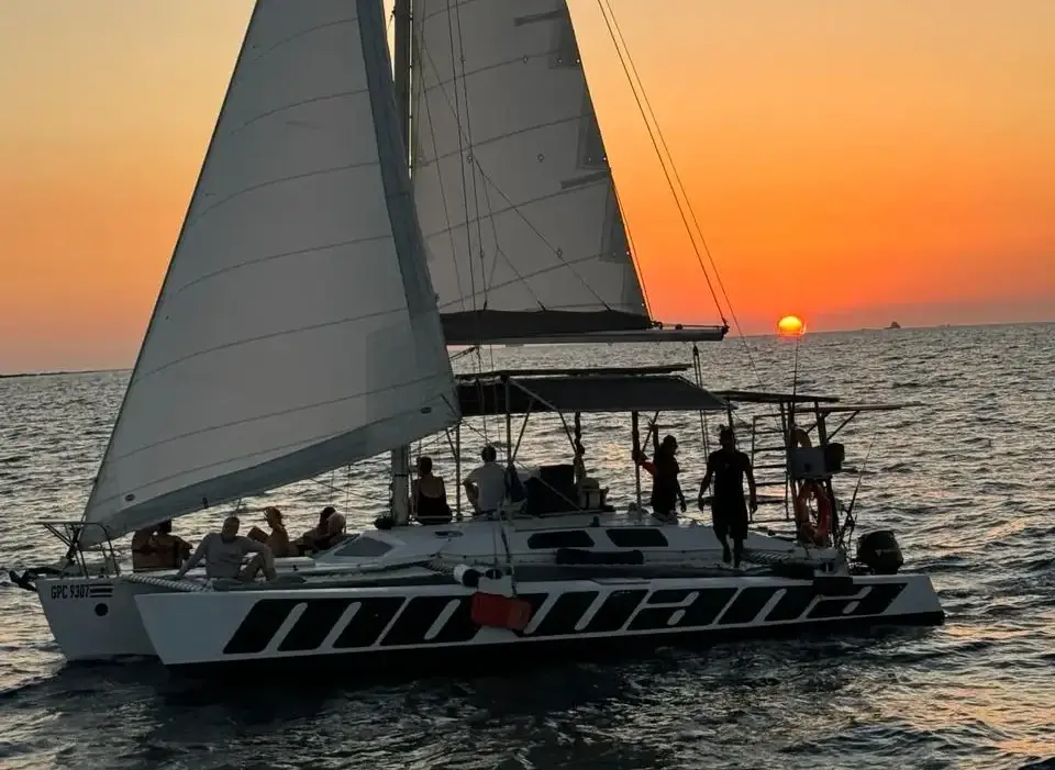 Mowana private sailing trimaran at sunset off Playa Flamingo, Guanacaste, Costa Rica
