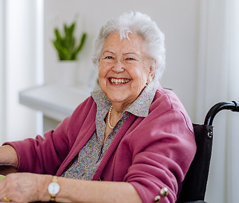 portrait-of-senior-woman-on-a-wheelchair