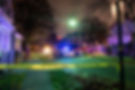 crime scene with tape and police car.jpg