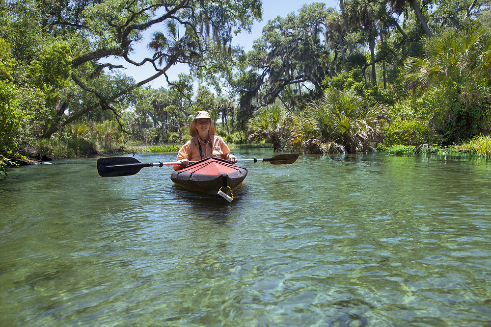 Woman Kayaking in Springs