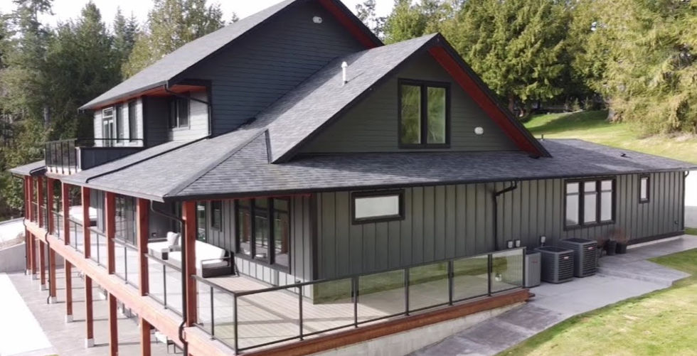 The same large custom Home built by Butula Developments showcasing the upper and lower deck