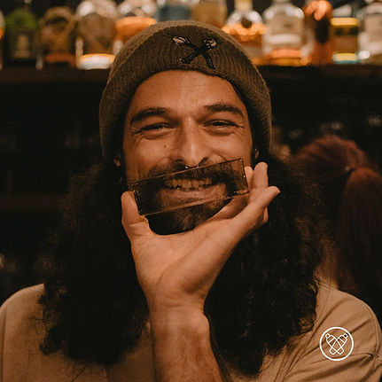 Miguel Castro da Silva smiling and holding a clear ice from Arctic Luxury Ice at The Craft Clash