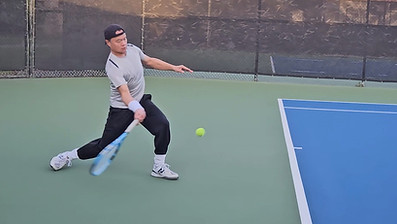 Chris Tennis Forehand.jpg