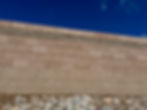 wall rebuild in tan fence block