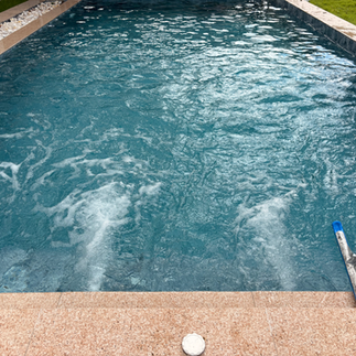 Adding salt to a saltwater swimming pool
