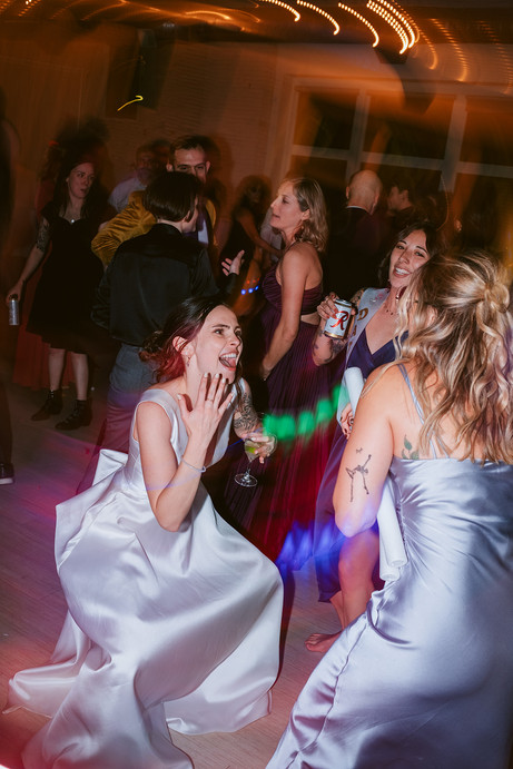 wild dancing at wedding motion blur and party lights