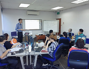 Allan Ung presenting the Project Planning course outline to participants