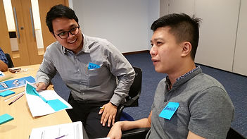 Design Thinking Workshop: Interviewing the user to gain insights of the user's experience.