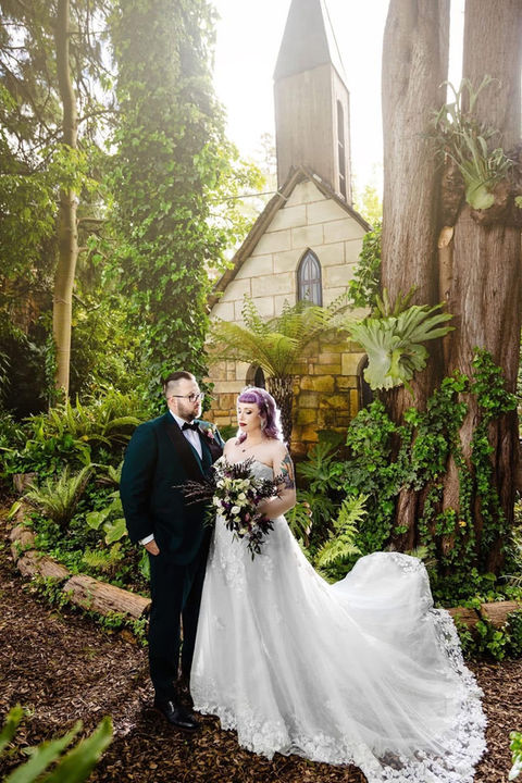 Outdoor bride with natural glam airbrush makeup and soft waves The Manor Basket Range
