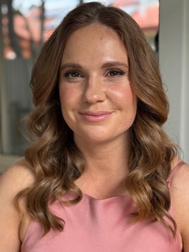 Natural glam special occasion makeup with soft waves and glowing complexion