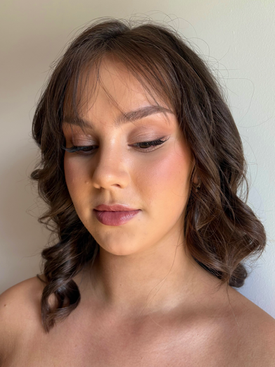 School formal makeup featuring soft bronze eyes and natural glowing skin