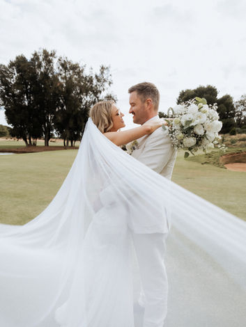Romantic wedding portrait with radiant bridal makeup, outdoor