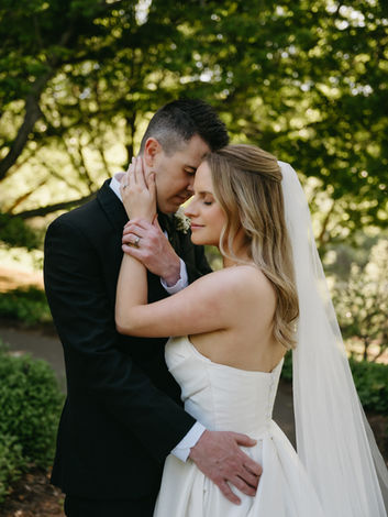 Soft glam bridal portrait with luminous skin and defined eyes