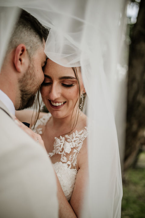 Soft bridal makeup with lifted lashes and glowing complexion, bride Adelaide