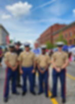 David Croft and Pete posing with four US Marines at Concord's Market Days